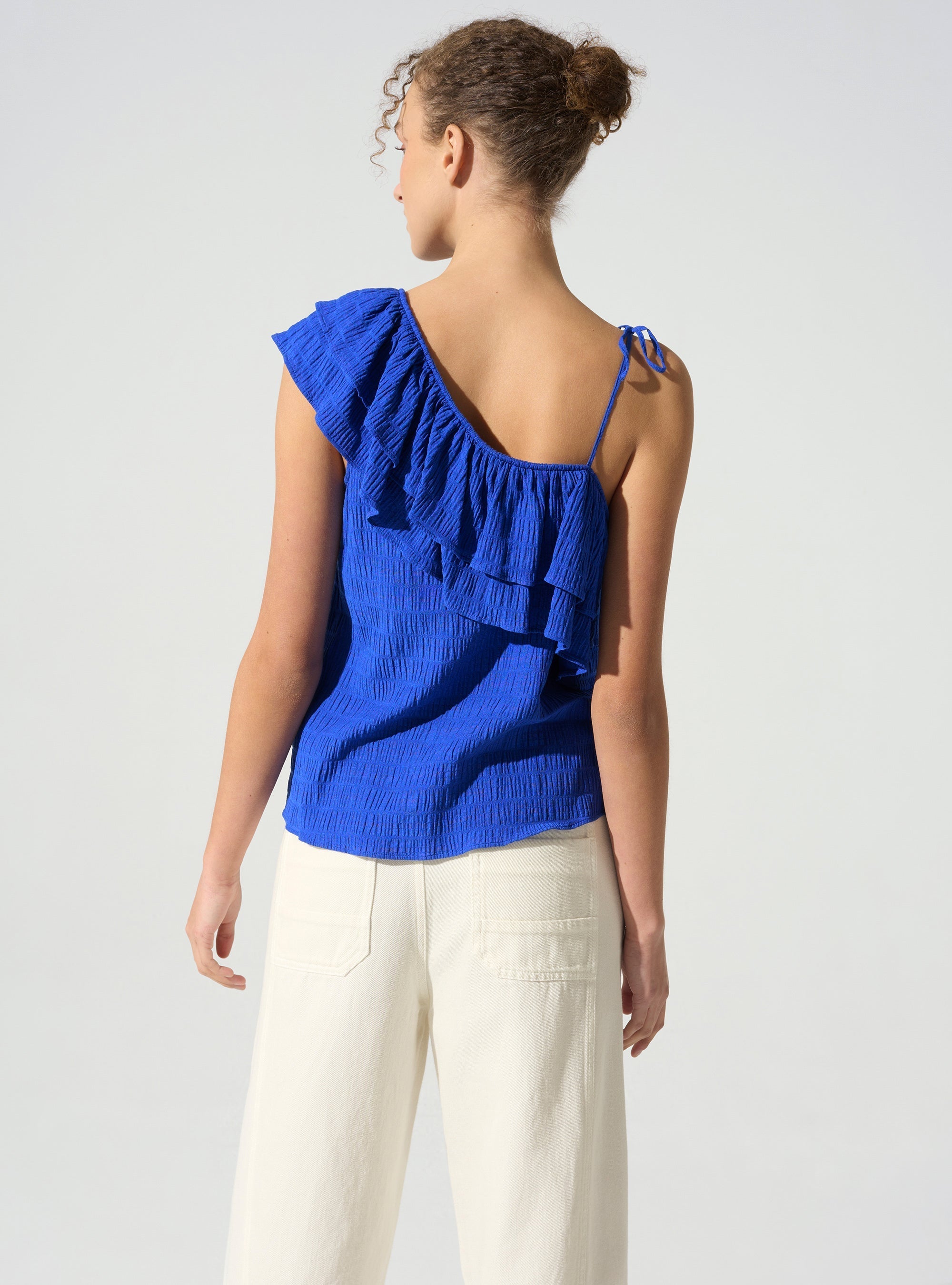 Top asymétrique acoté