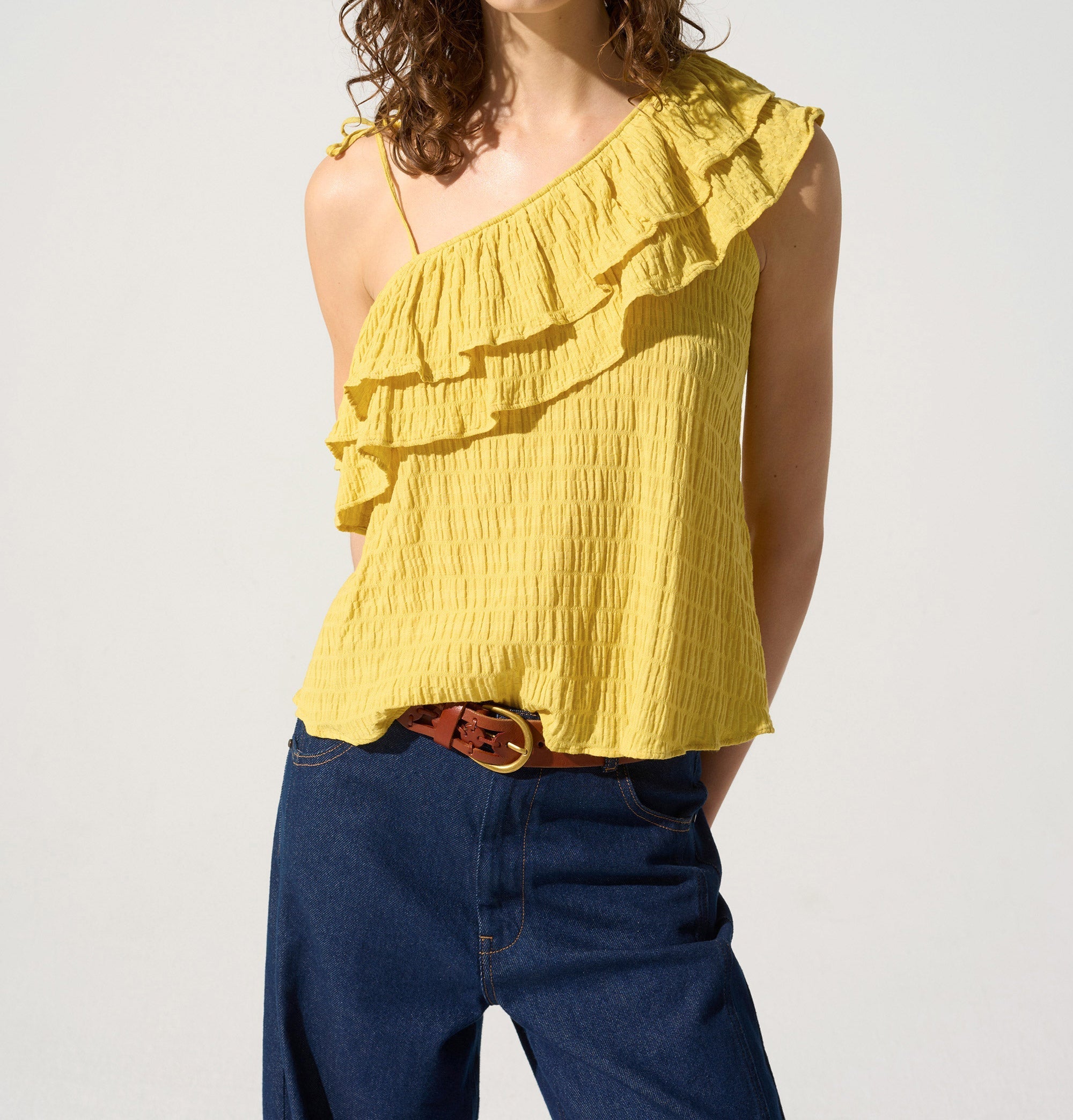 Top asymétrique acoté