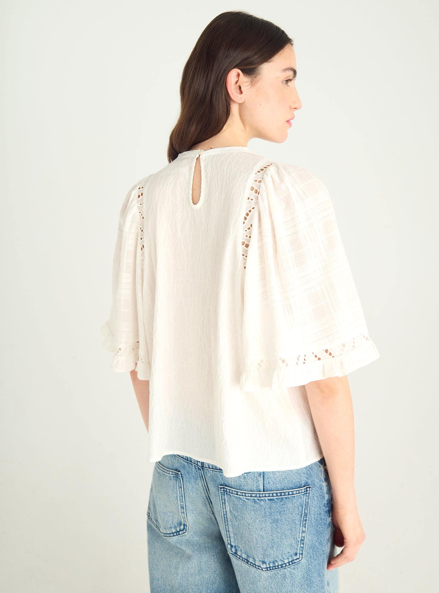 Loose-fitting openwork cotton blouse