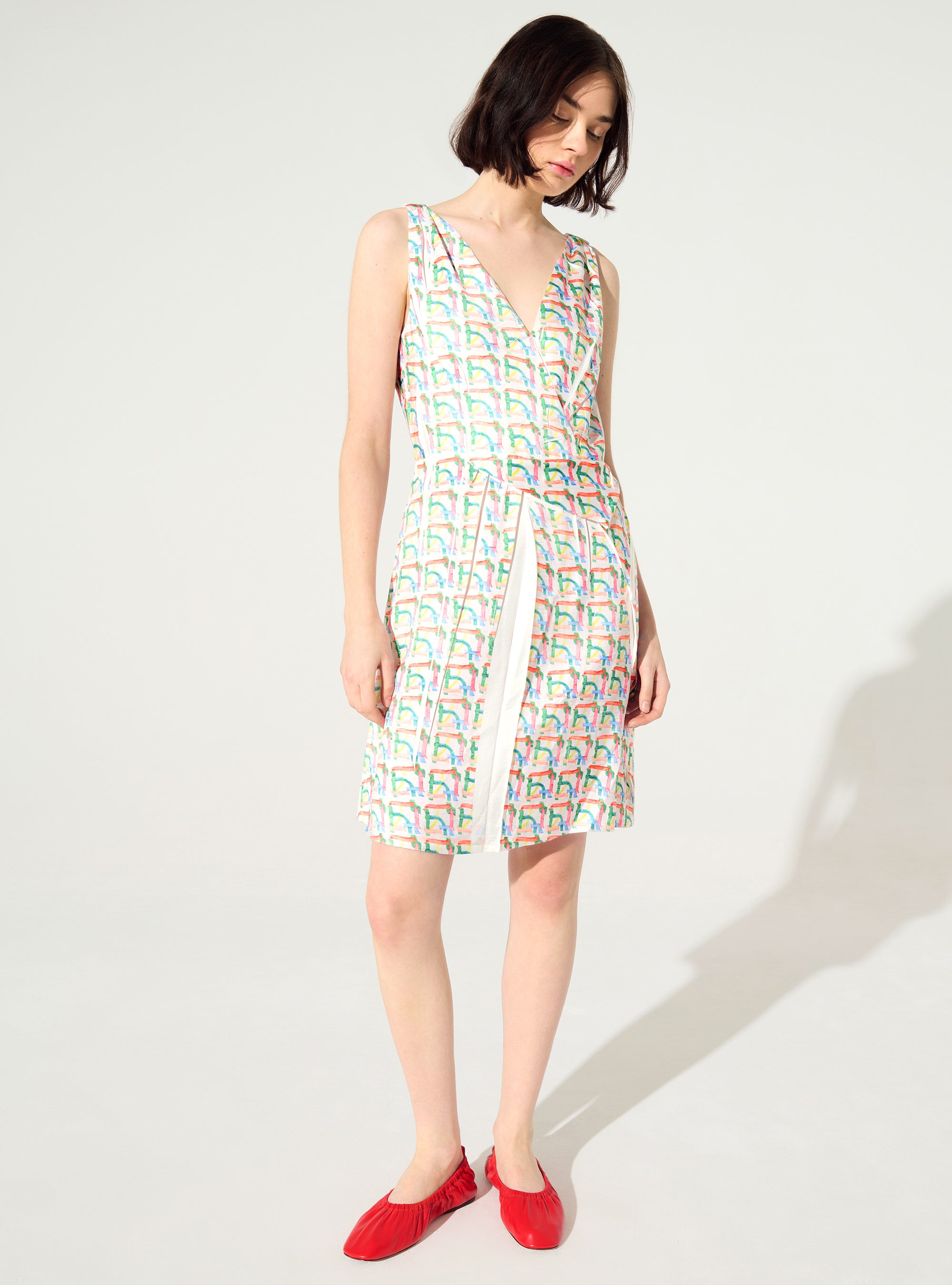 Robe ajustée plissée sublimée