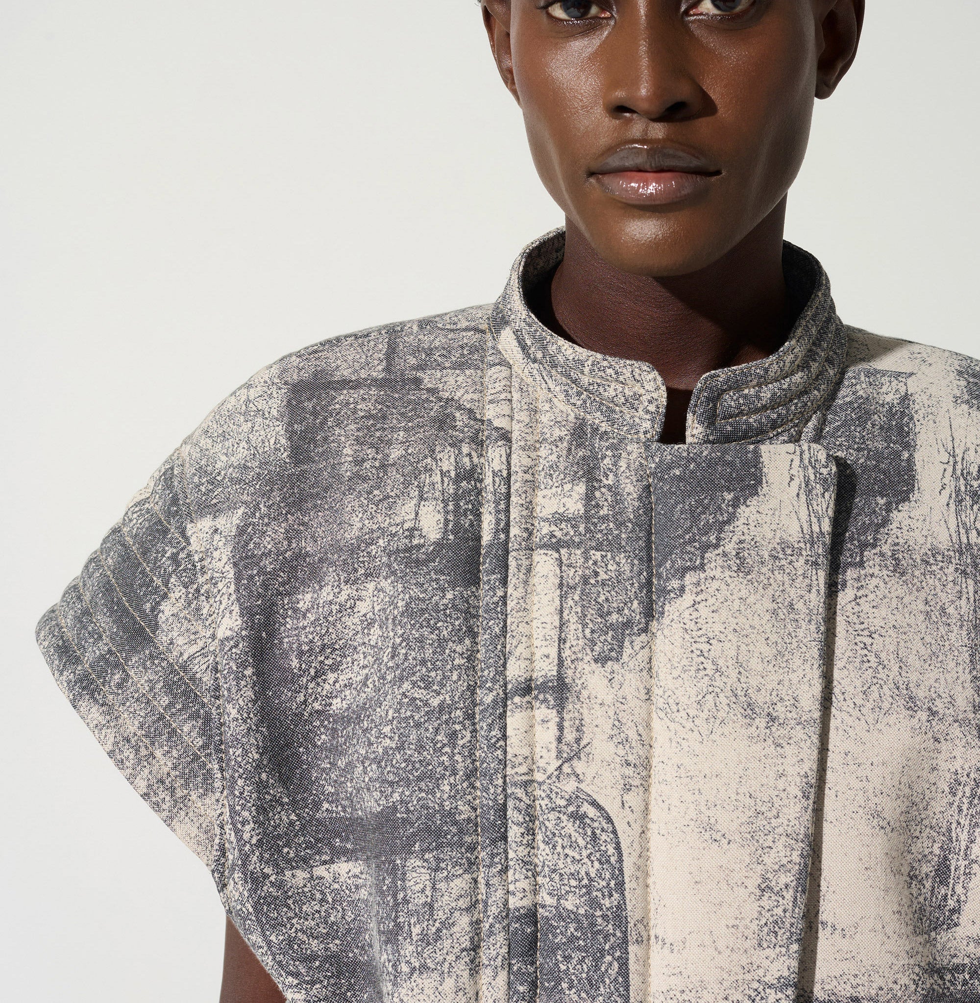 Quilted cap sleeve jacket