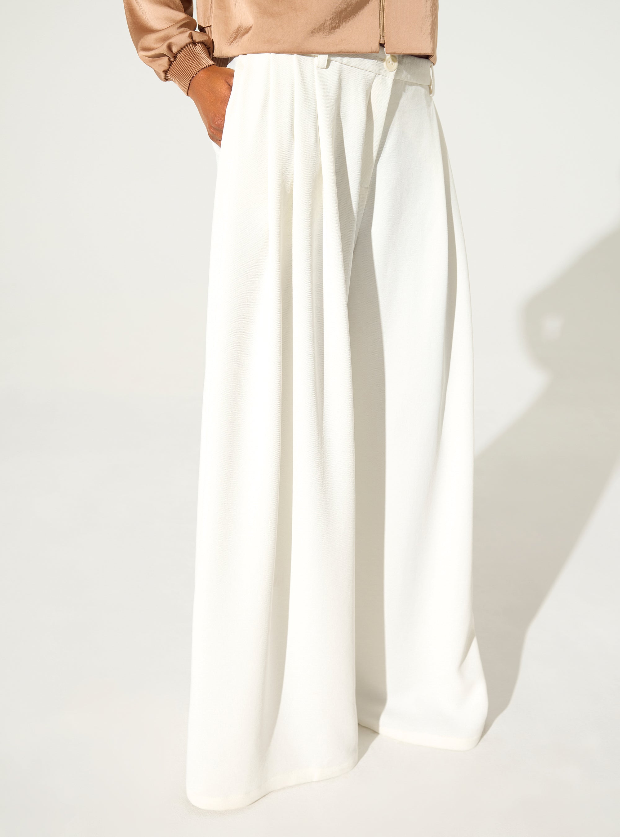 Wide-legged white trousers