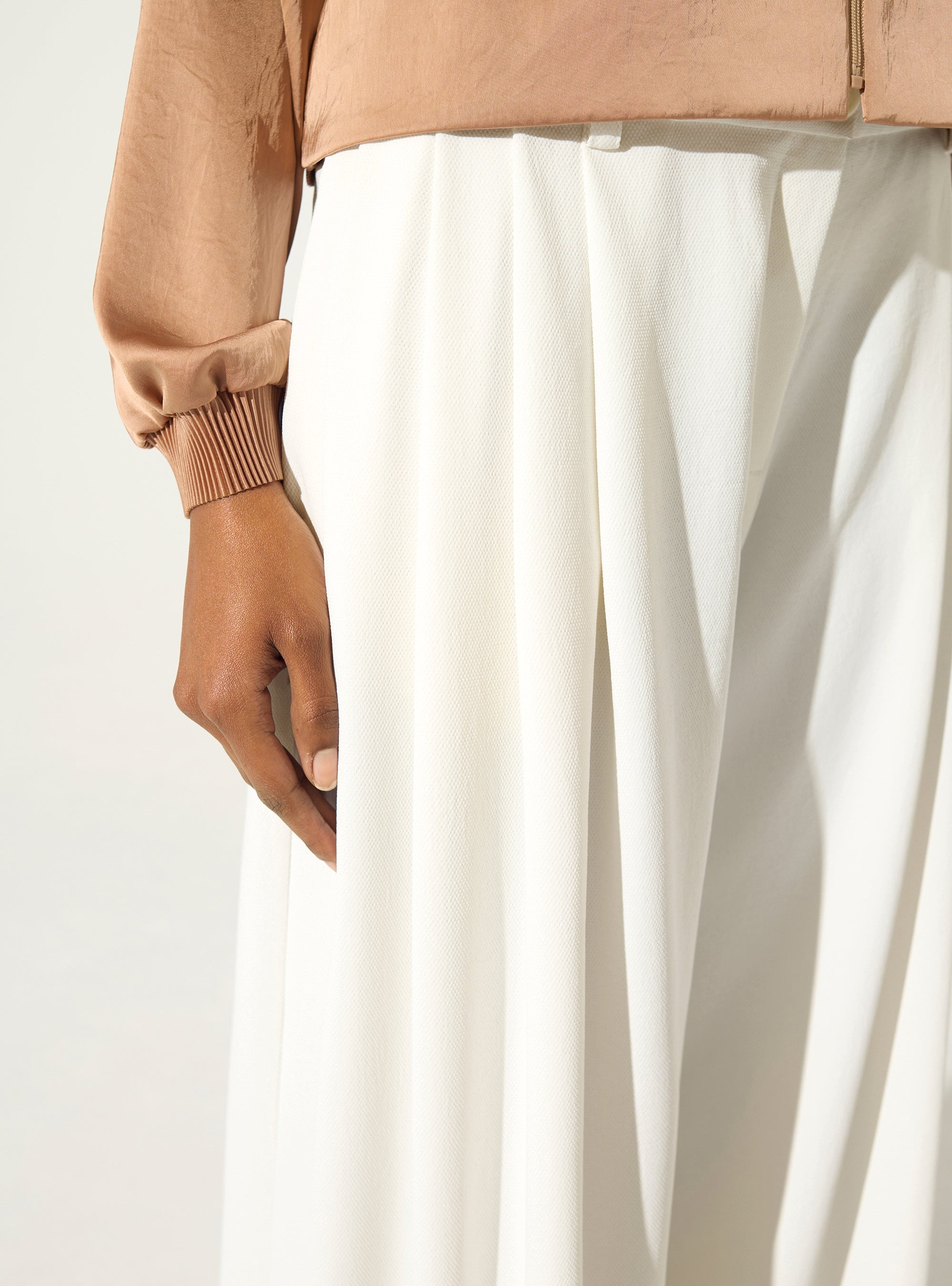 Wide-legged white trousers