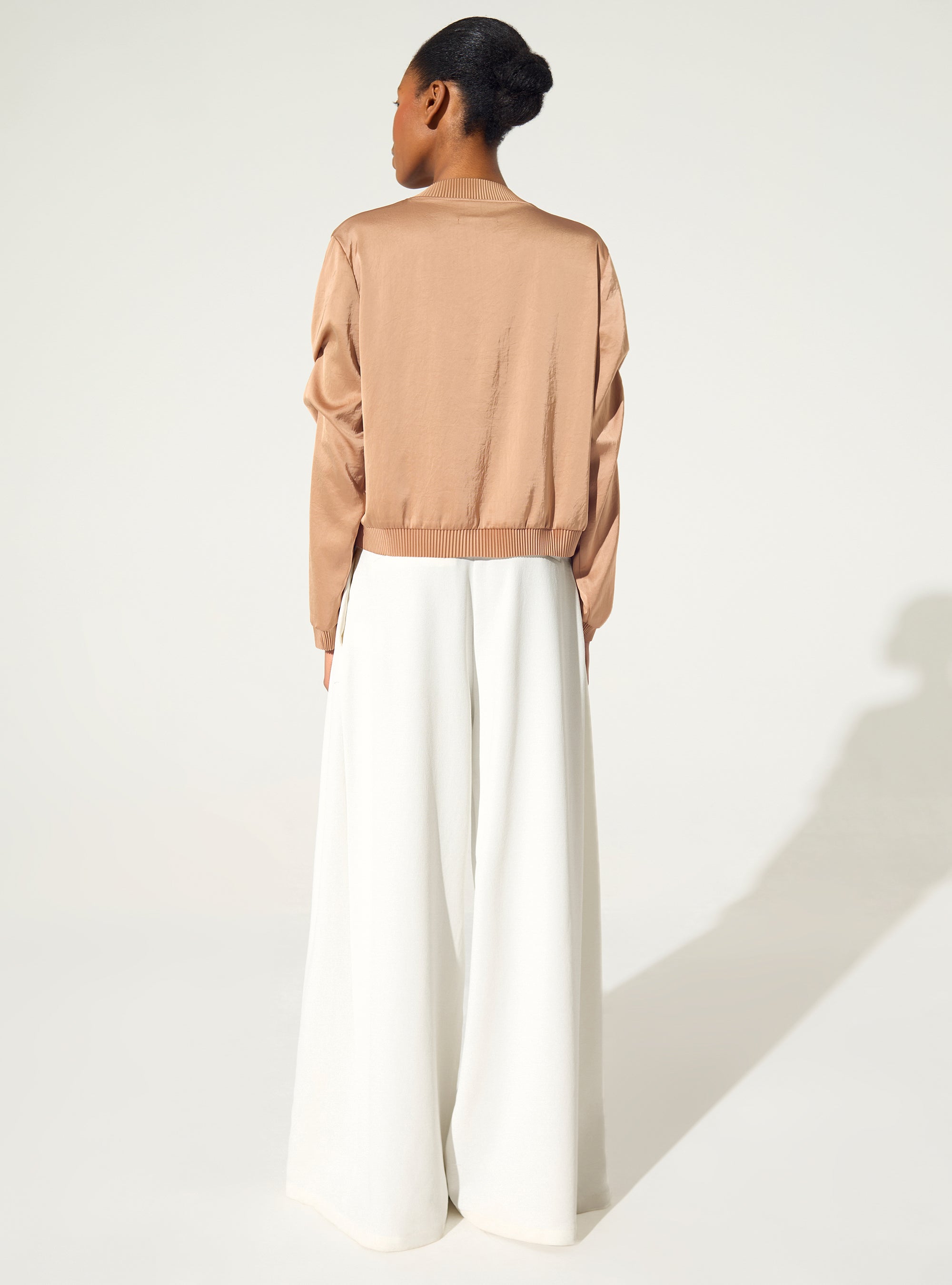 Wide-legged white trousers