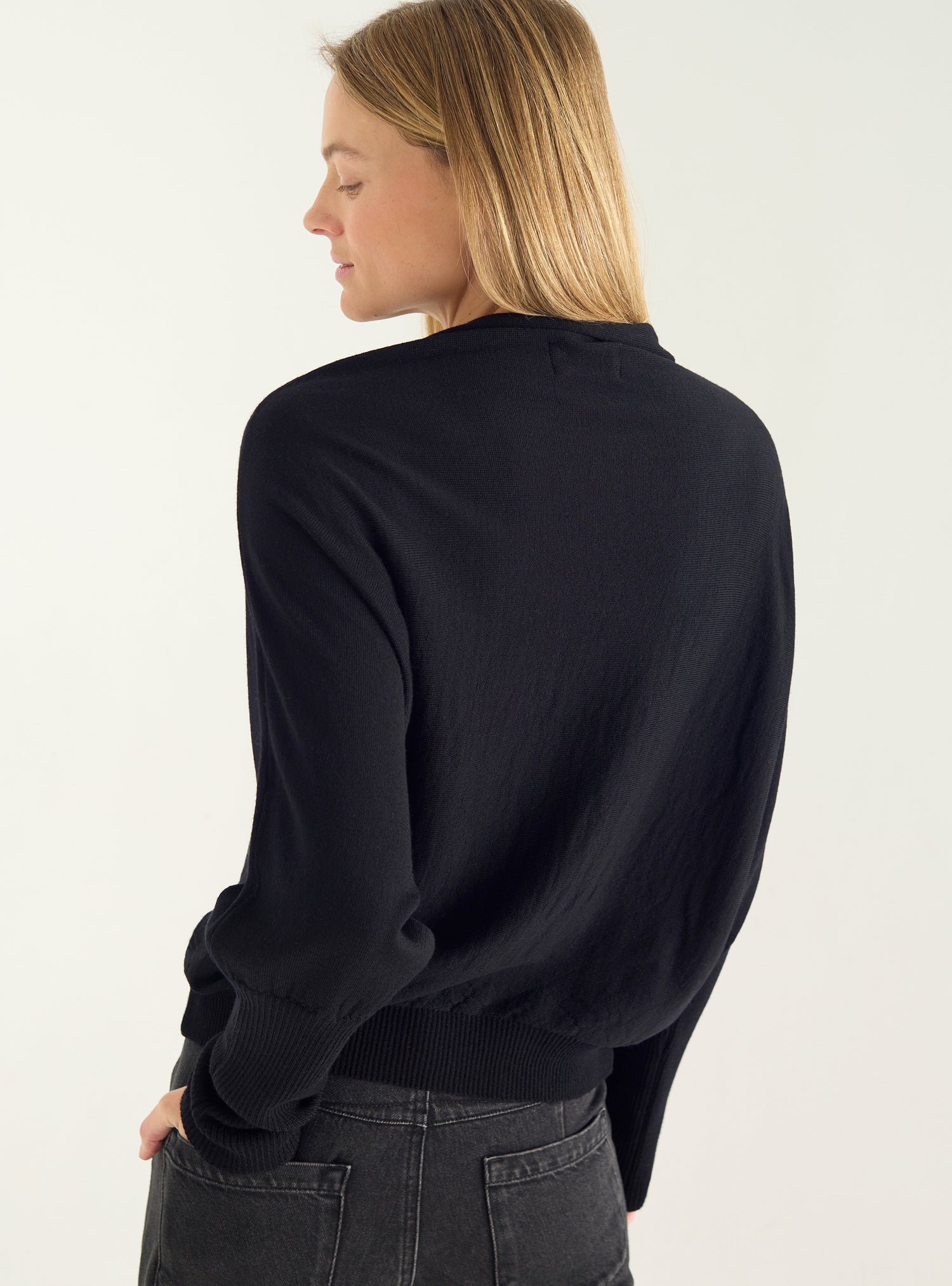 Oversized sweater with draped collar