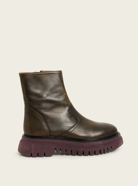 Black patinated leather ankle boots