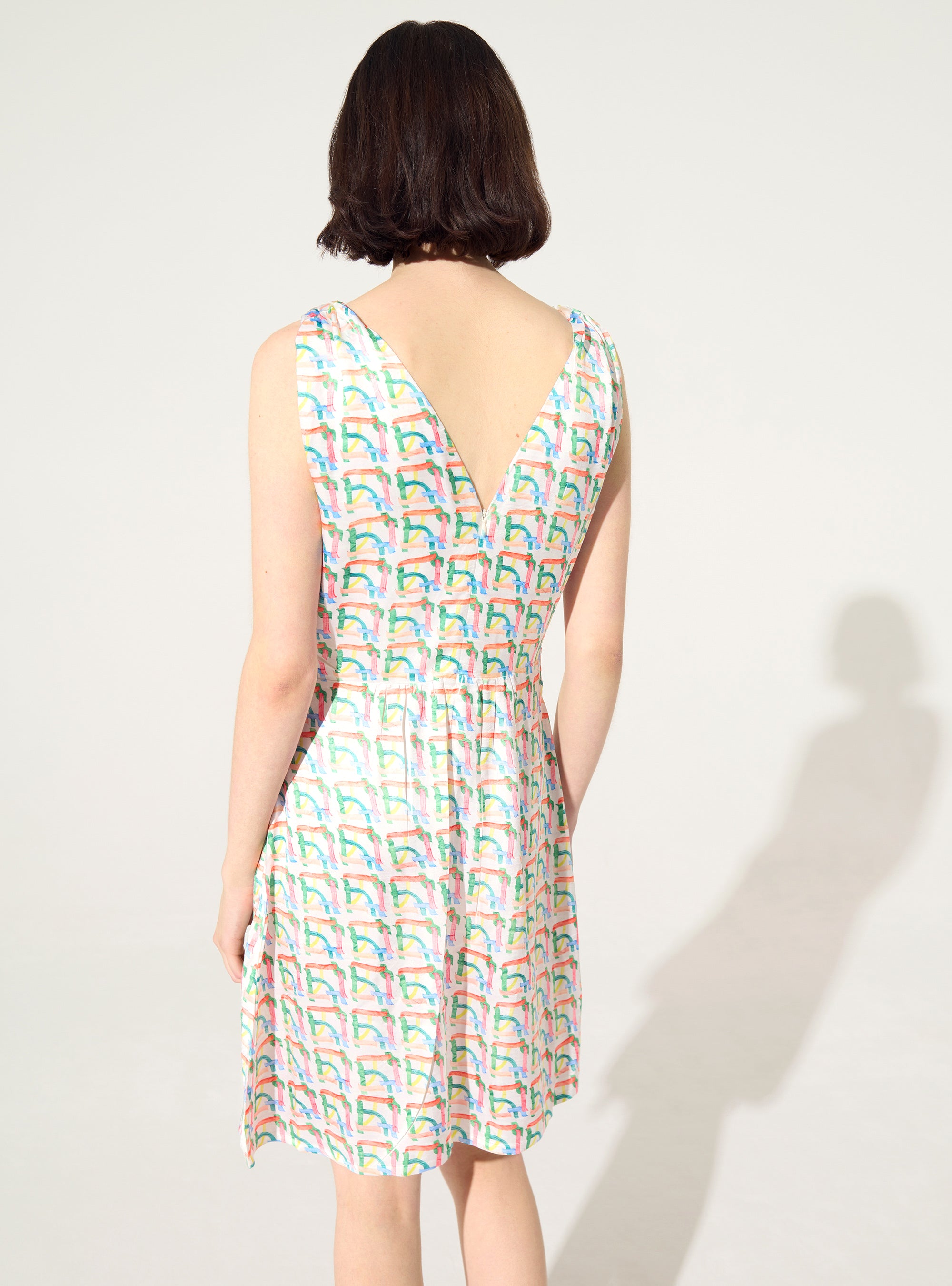 Robe ajustée plissée sublimée