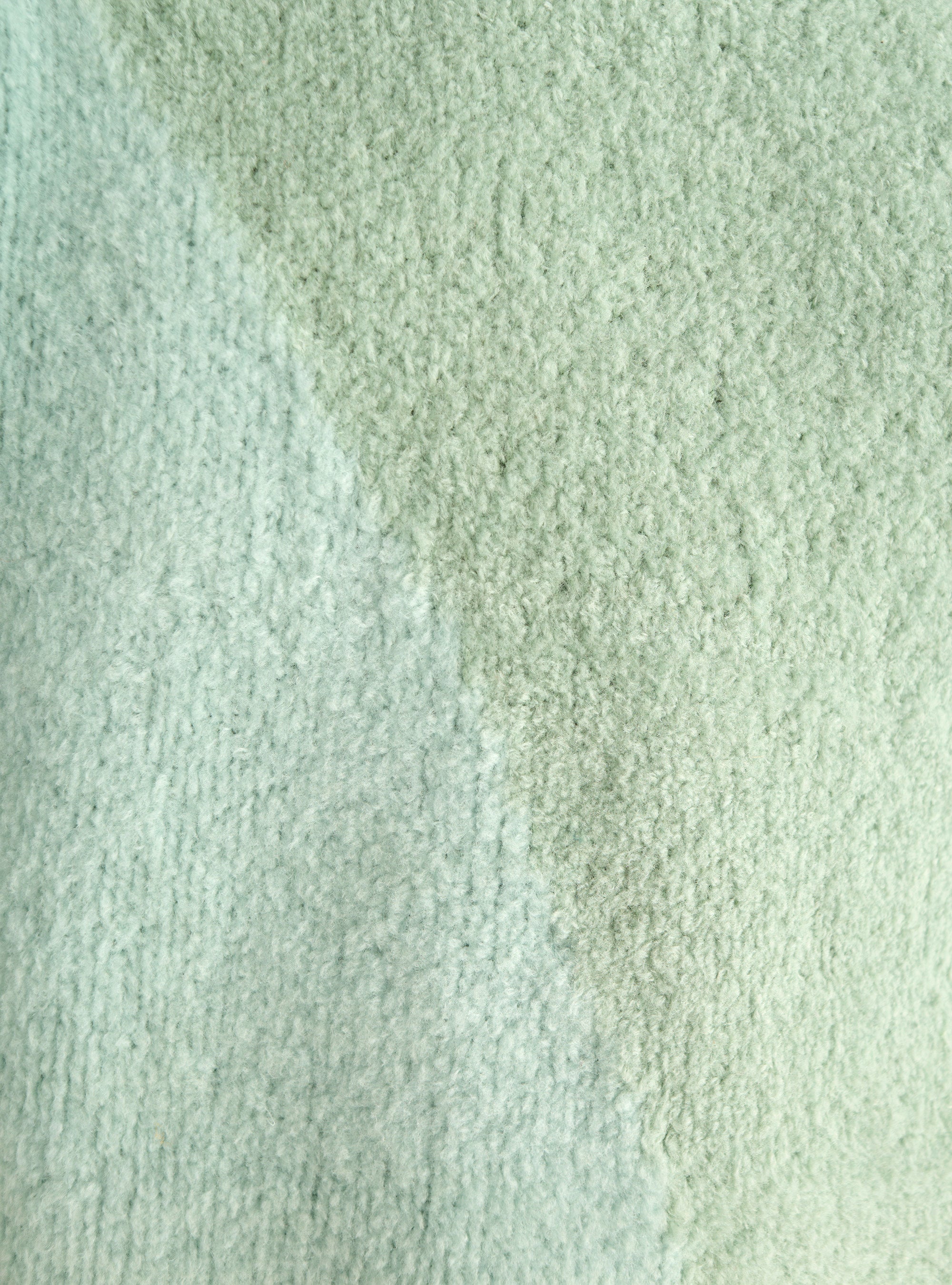 Sleeveless terry wool sweater