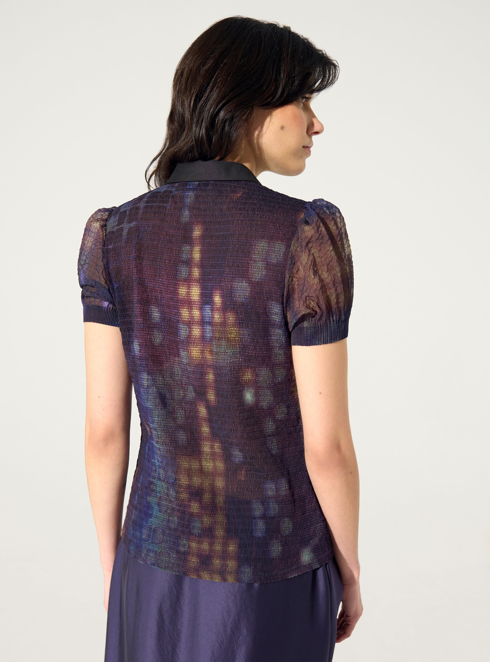 Polo ajusté plissé imprimé maison violet