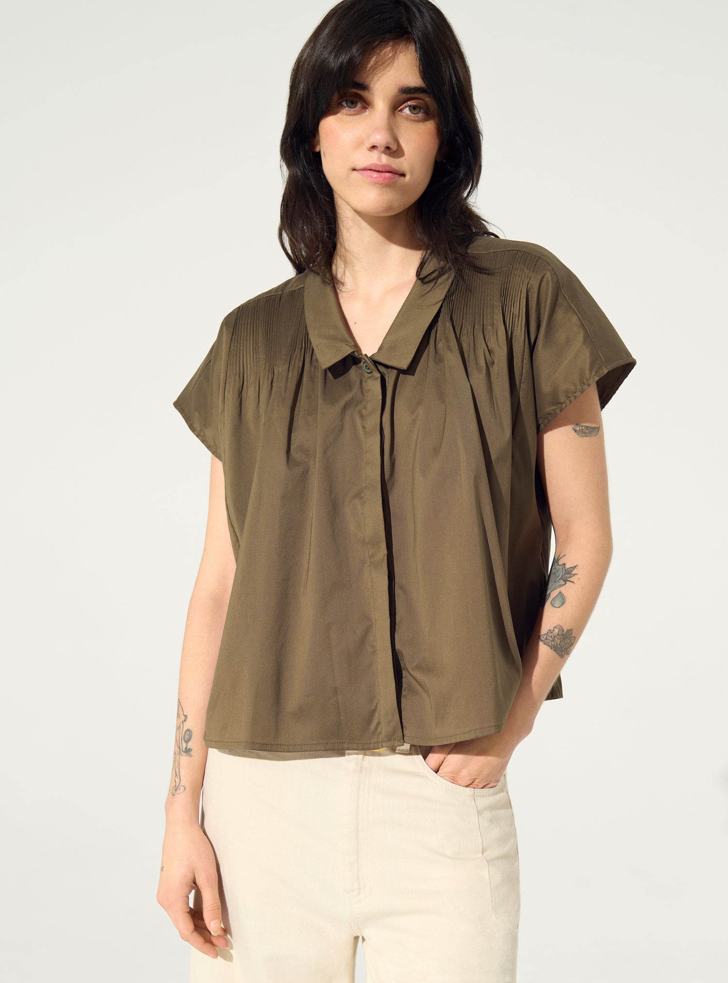Brown pleated shirt