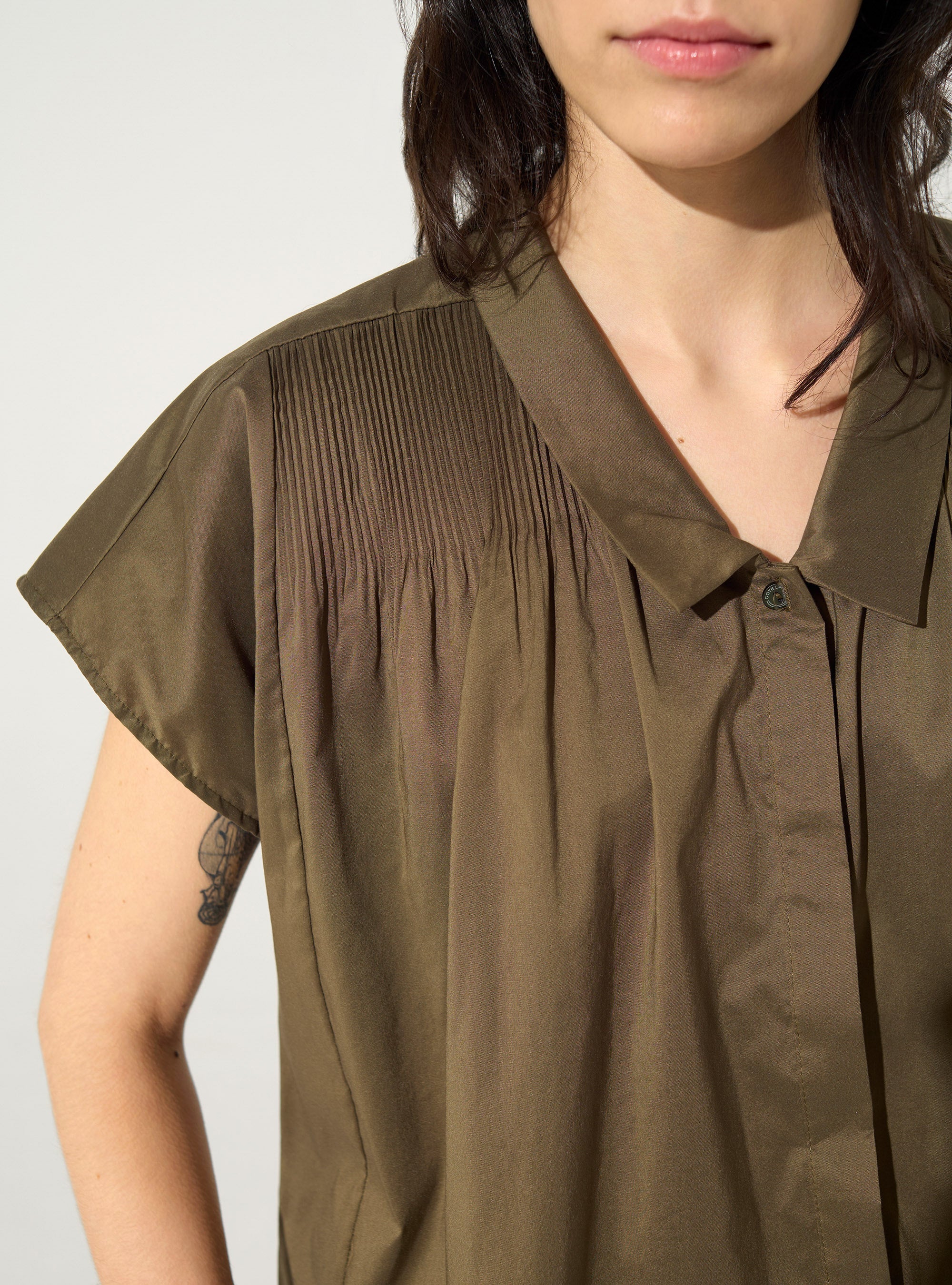 Brown pleated shirt