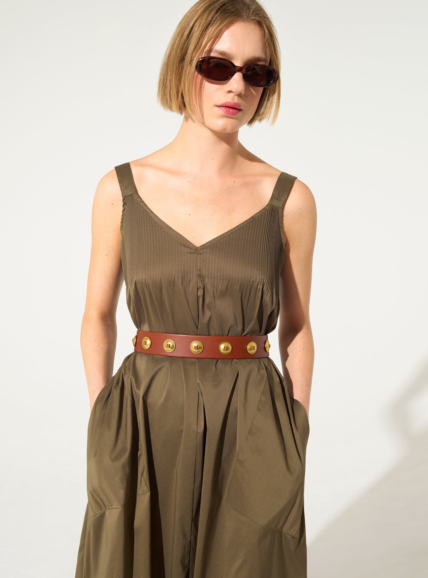 Long pleated brown dress