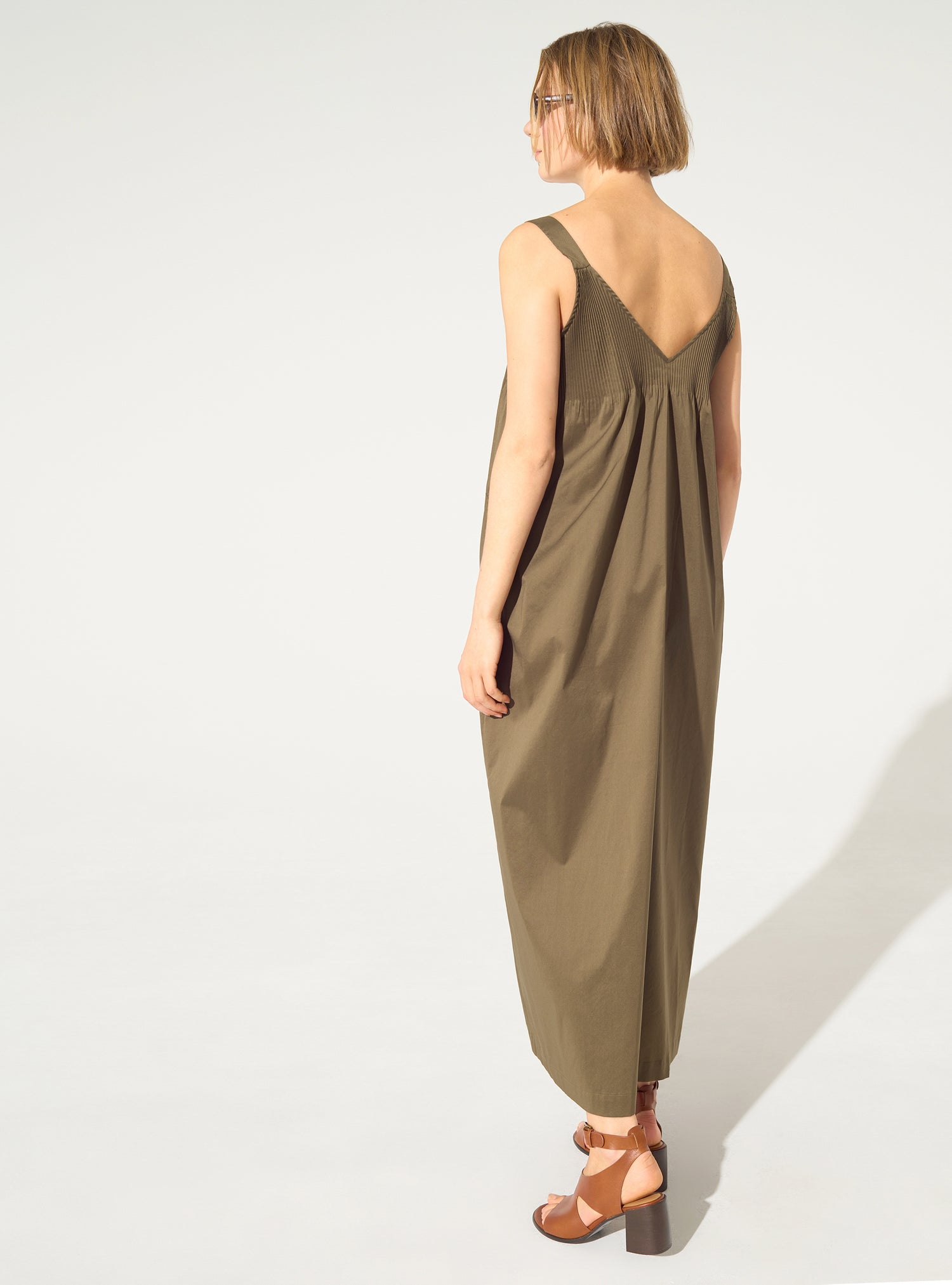 Long pleated brown dress