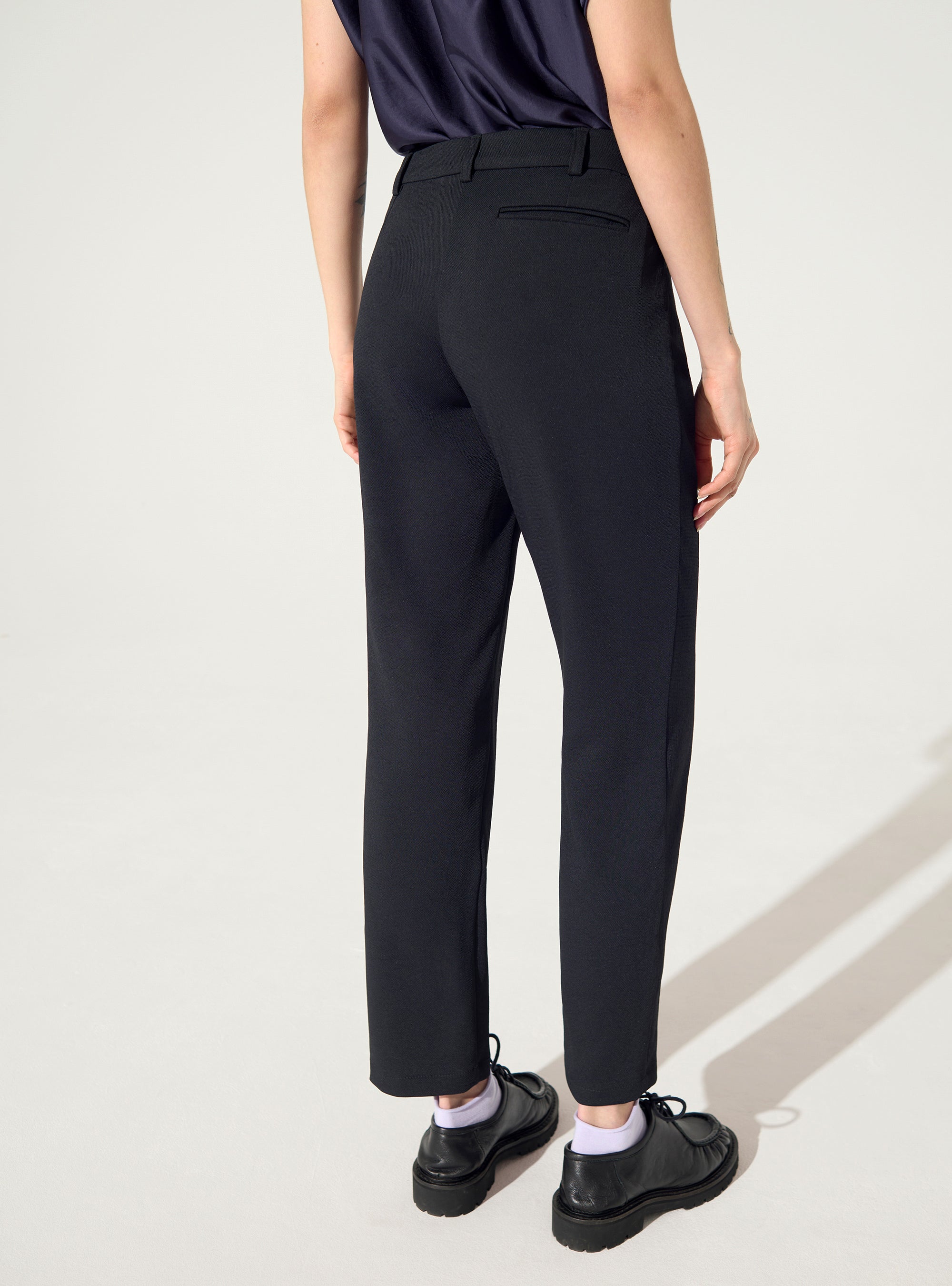 Black straight-leg trousers