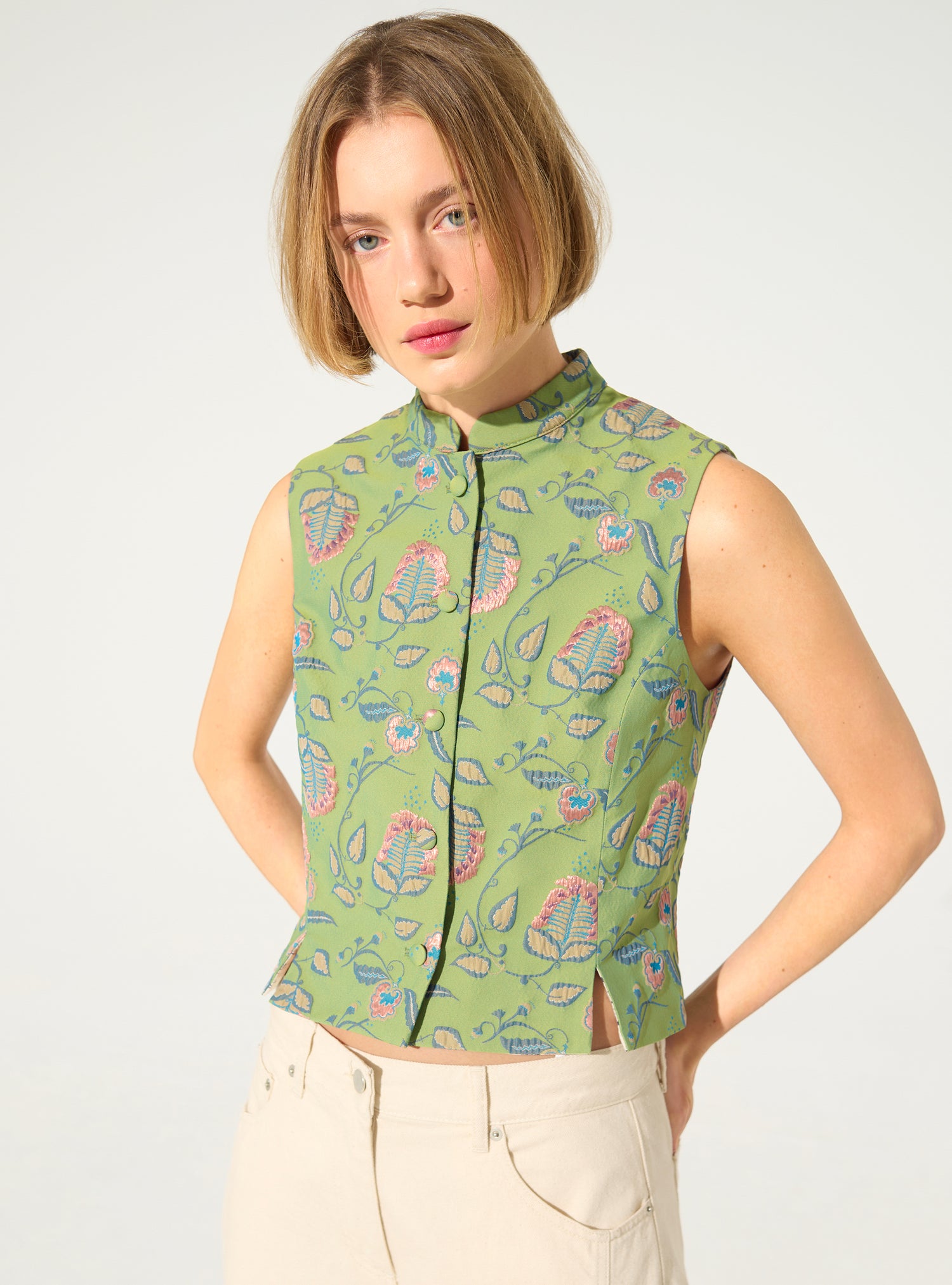 Fitted vest with green print